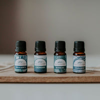 The Cabin Collection essential oils made of Chinook blend (lavender and peppermint), Healer's Blend (traditional thieves blend), Boreal Blend and Cleanse blend. Bring the cabin home